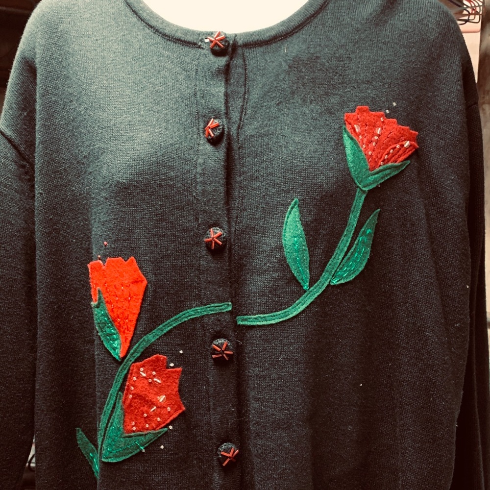 Black sweater with appliqué flowers